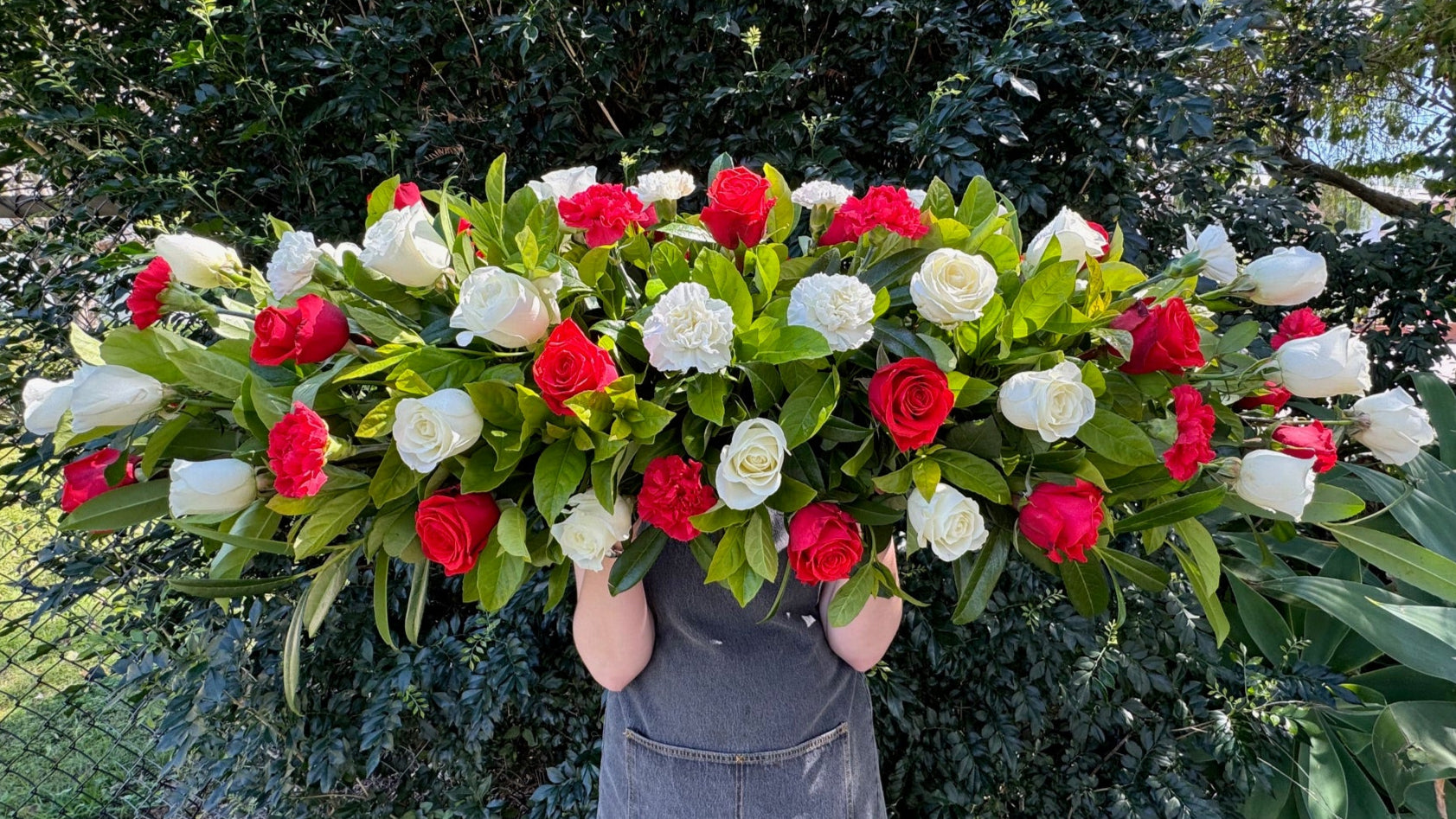 RED & WHITE ROSE & CARNATION MIXED CASKET SPRAY
