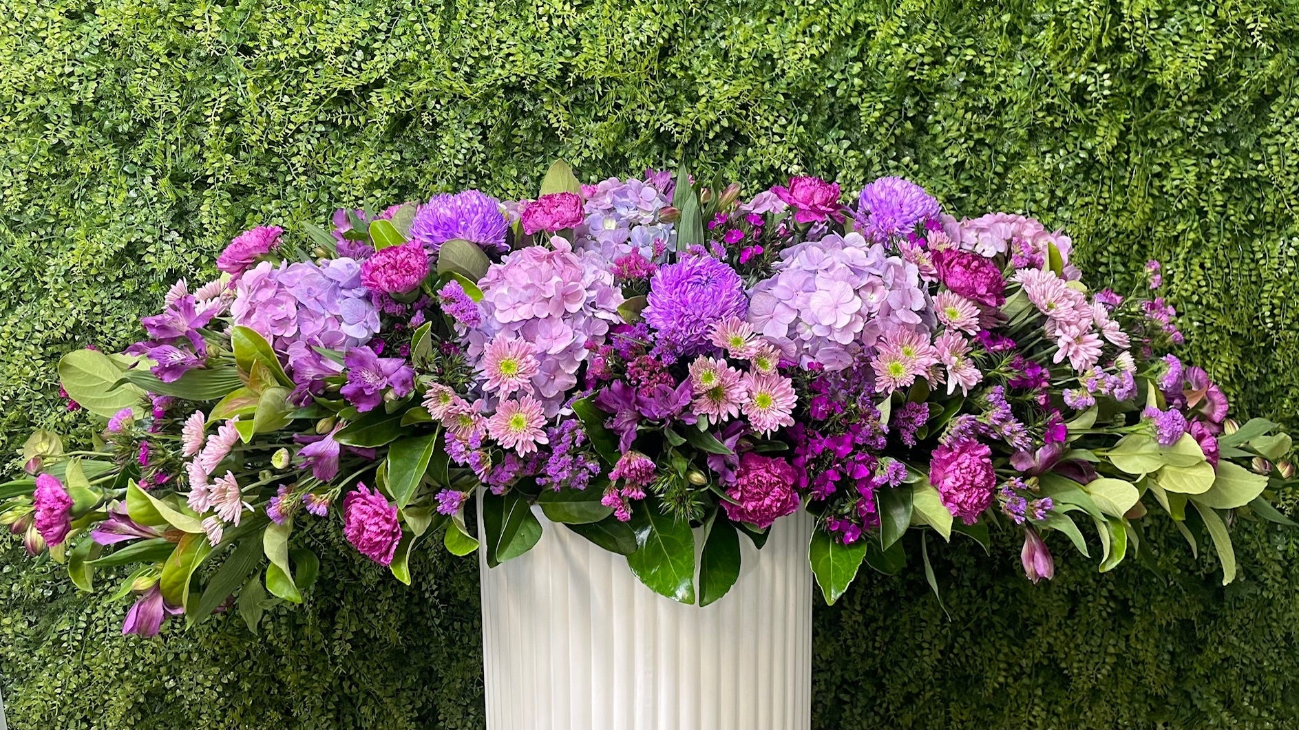 PURPLE CASKET SPRAY