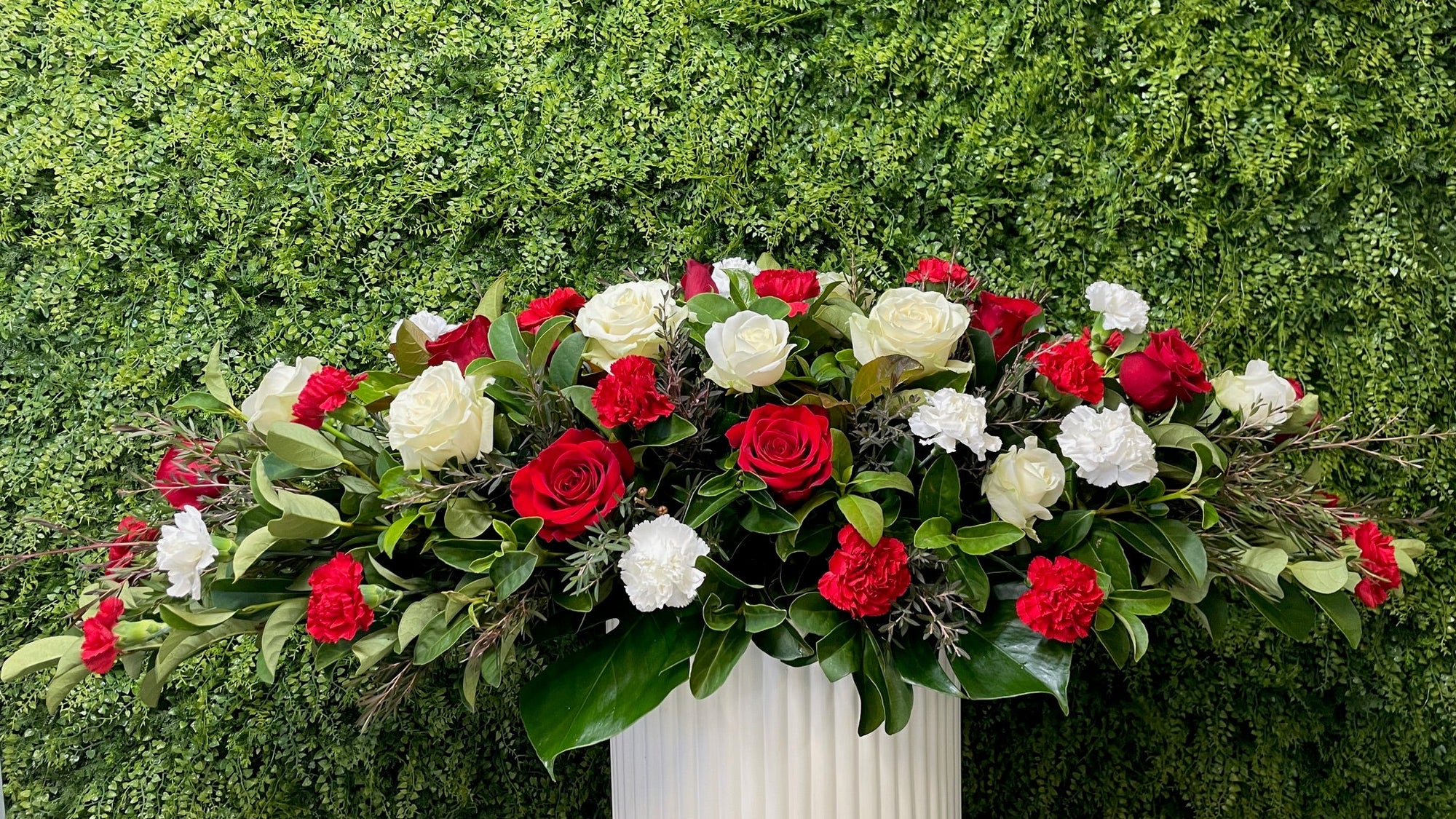 RED & WHITE ROSE & CARNATION MIXED CASKET SPRAY