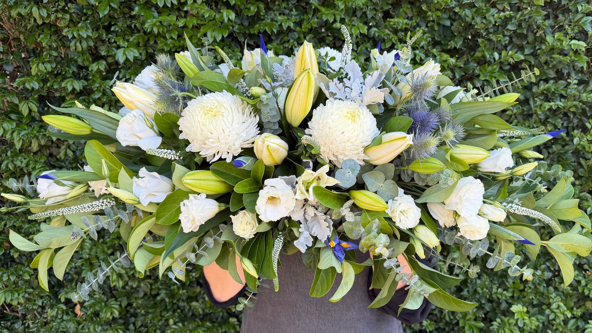 BLUE & WHITE CASKET SPRAY